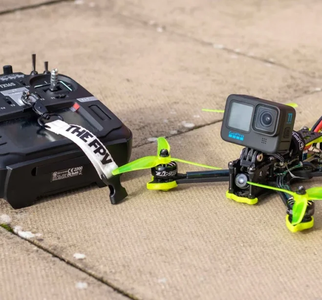 a-drone-and-a-drone-controller-14828474
